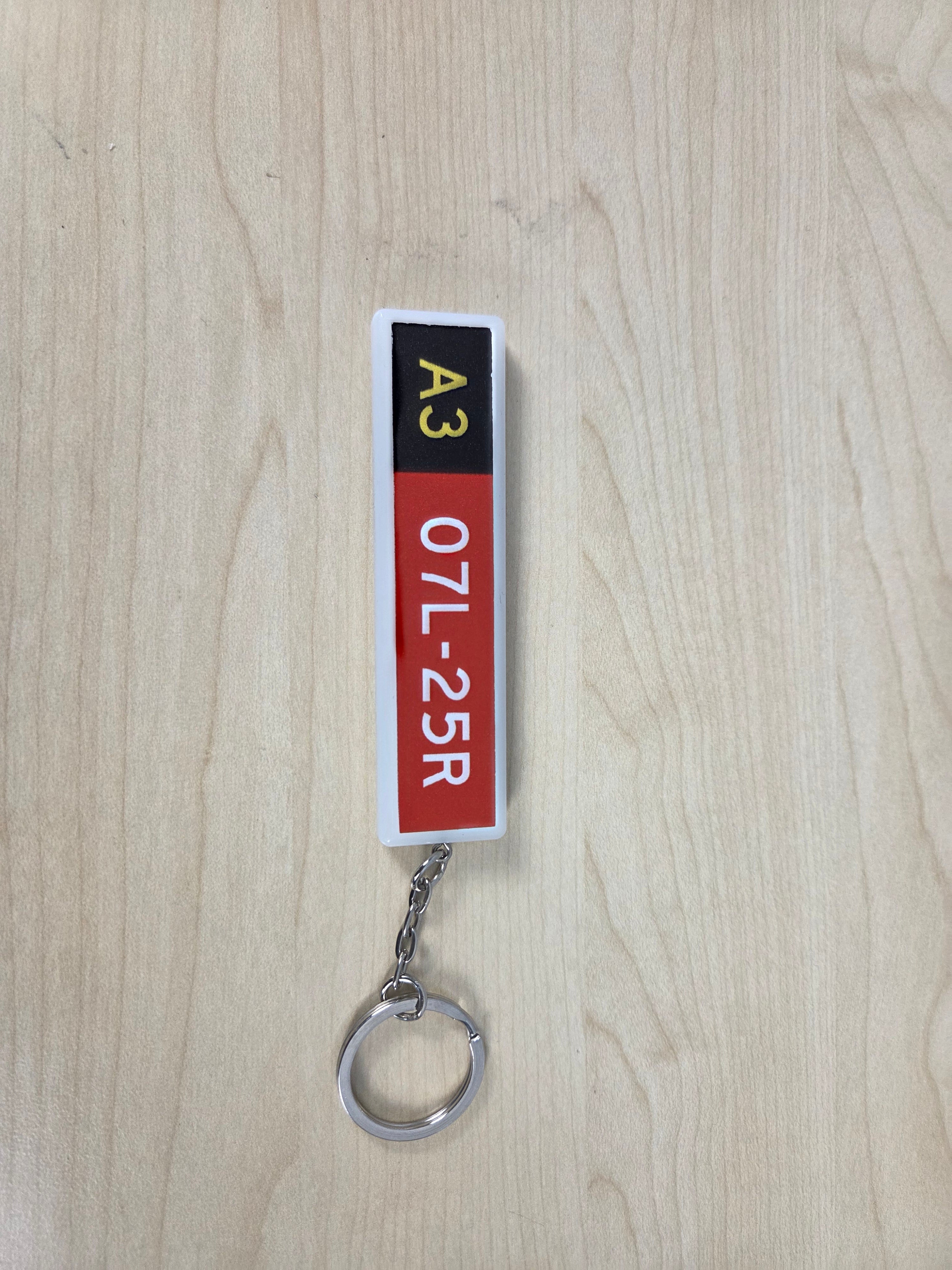 Runway sign keychain