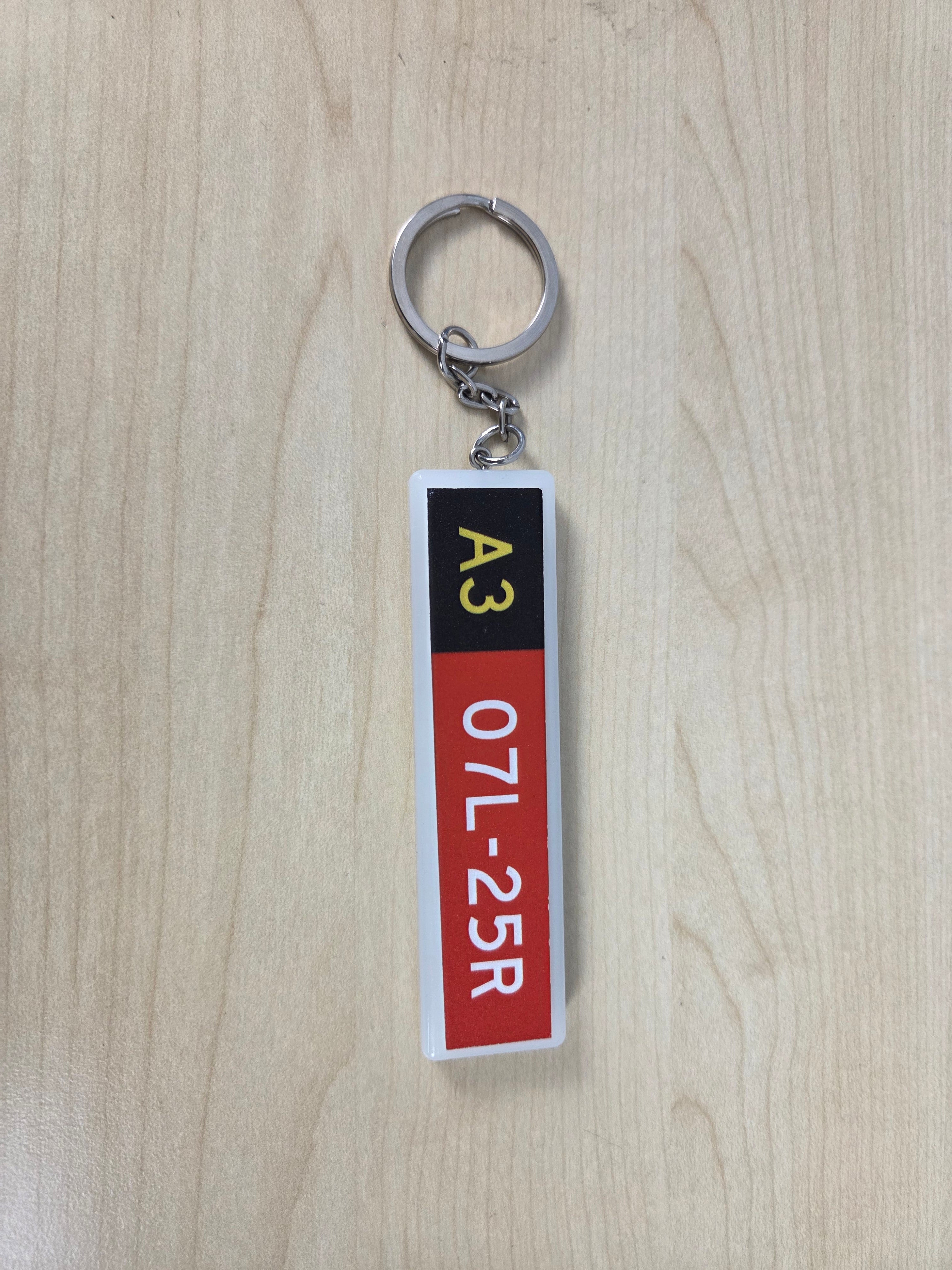 Runway sign keychain