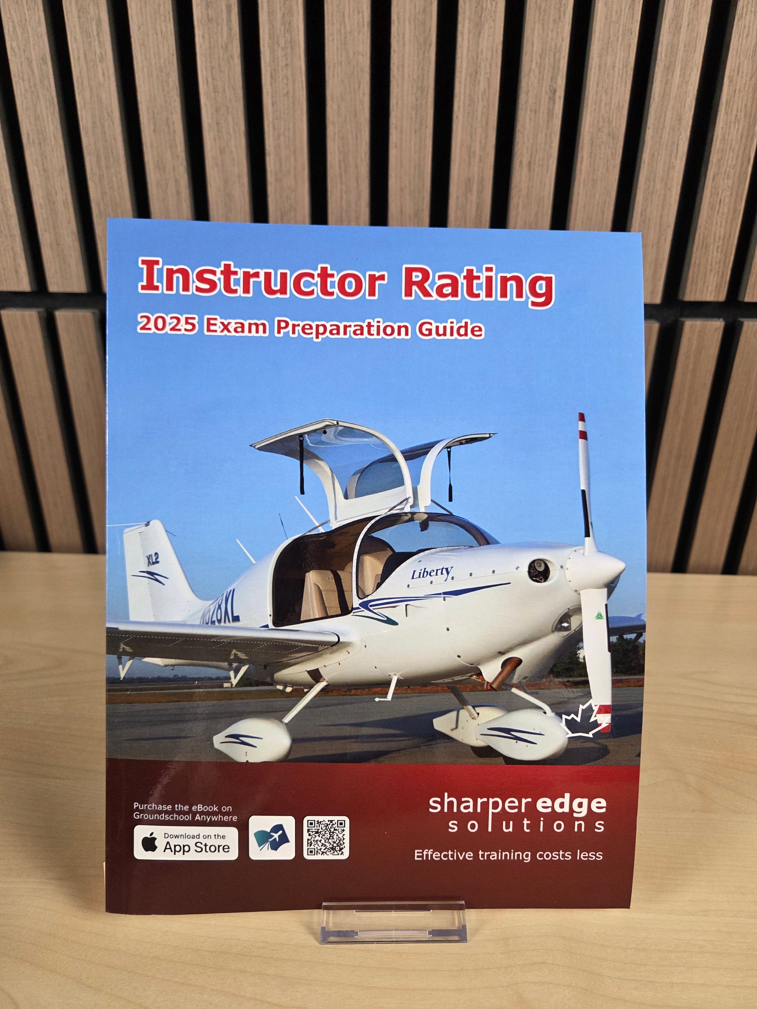 Book titled 'Instructor Rating 2025 Exam Preparation Guide' with an airplane on the cover, placed on a wooden surface.