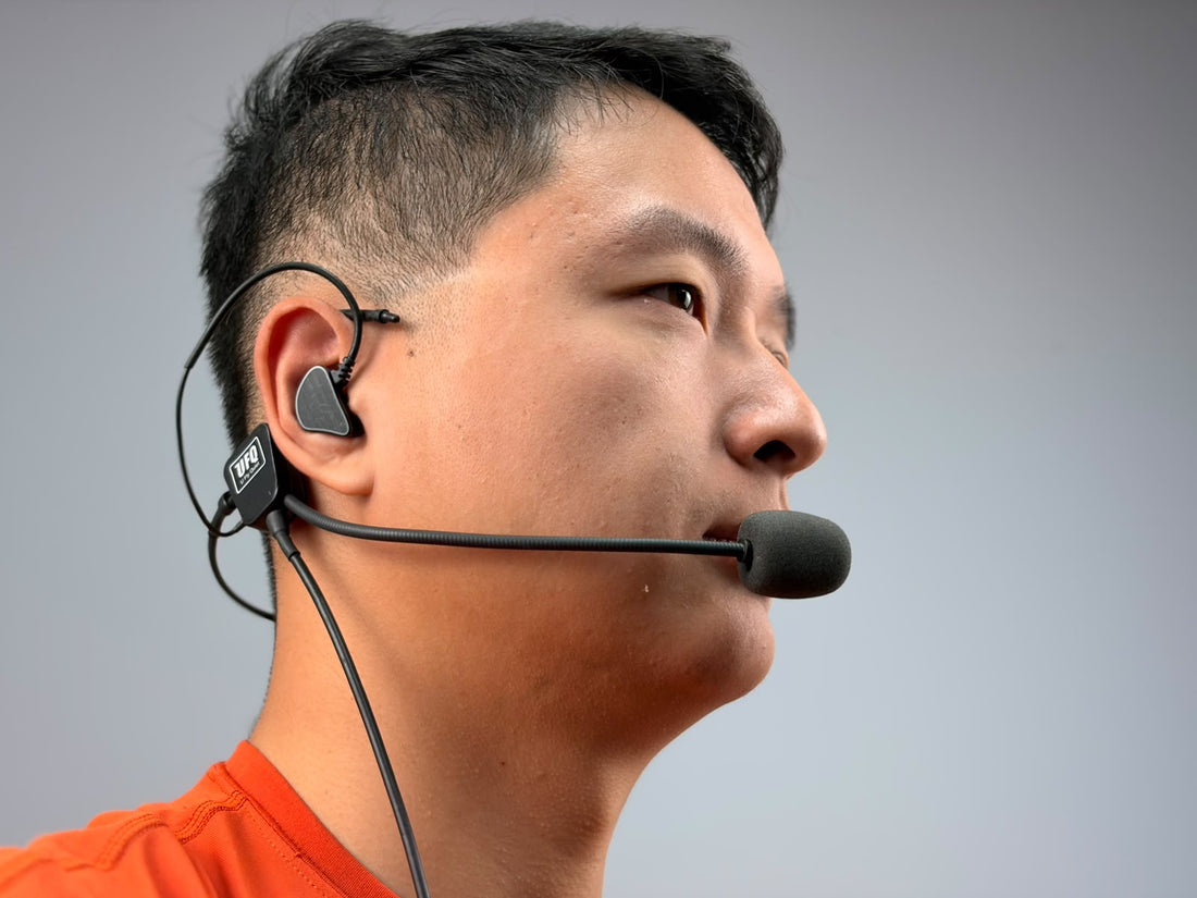 A person wearing UFQ L2 aviation headset